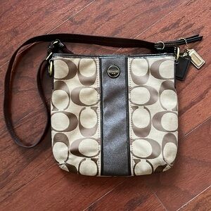 Coach brown crossbody bag. Still a lot of life left. Worn spots shown in pics.